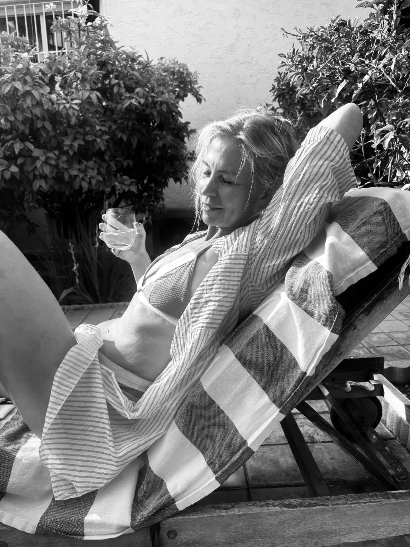Cecilia Tibell resting in a deck chair in the sun